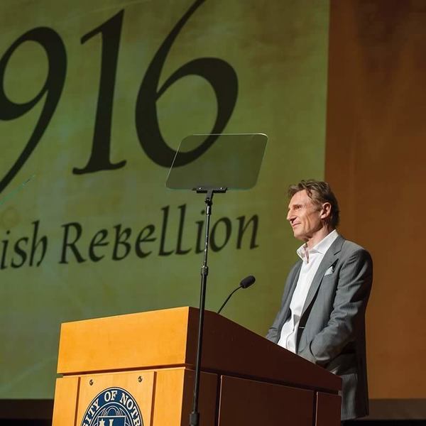 Liam Neeson, narrator of the film gives opening remarks at the Gala Premiere of the documentary 1916: The Irish Rebellion in the Leighton Concert Hall at the DeBartolo Performing Arts Center in Notre Dame, IN.