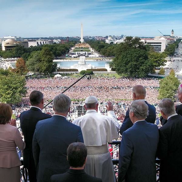 Pope Francis waves to the crowd from the Speakers Balcony at the US Capitol  in Washington, DC.